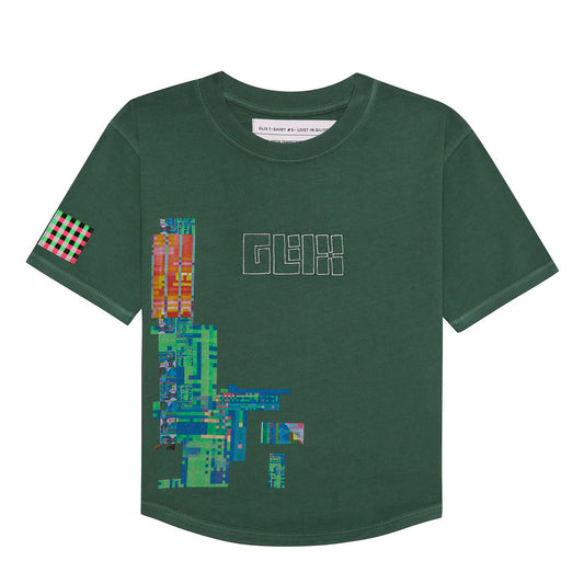 Front flat lay of the GLIX green crop top baby tee featuring a white embroidered logo, a vertical pixelated glitch graphic, and a pink and green checkered patch on the sleeve.