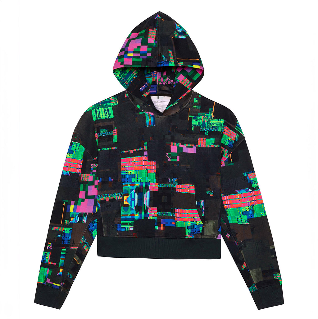 Front flat lay of the GLIX "Screen Error" oversized black hoodie with the hood up, showcasing the continuous vibrant neon digital glitch pattern across the hood, body, and sleeves.