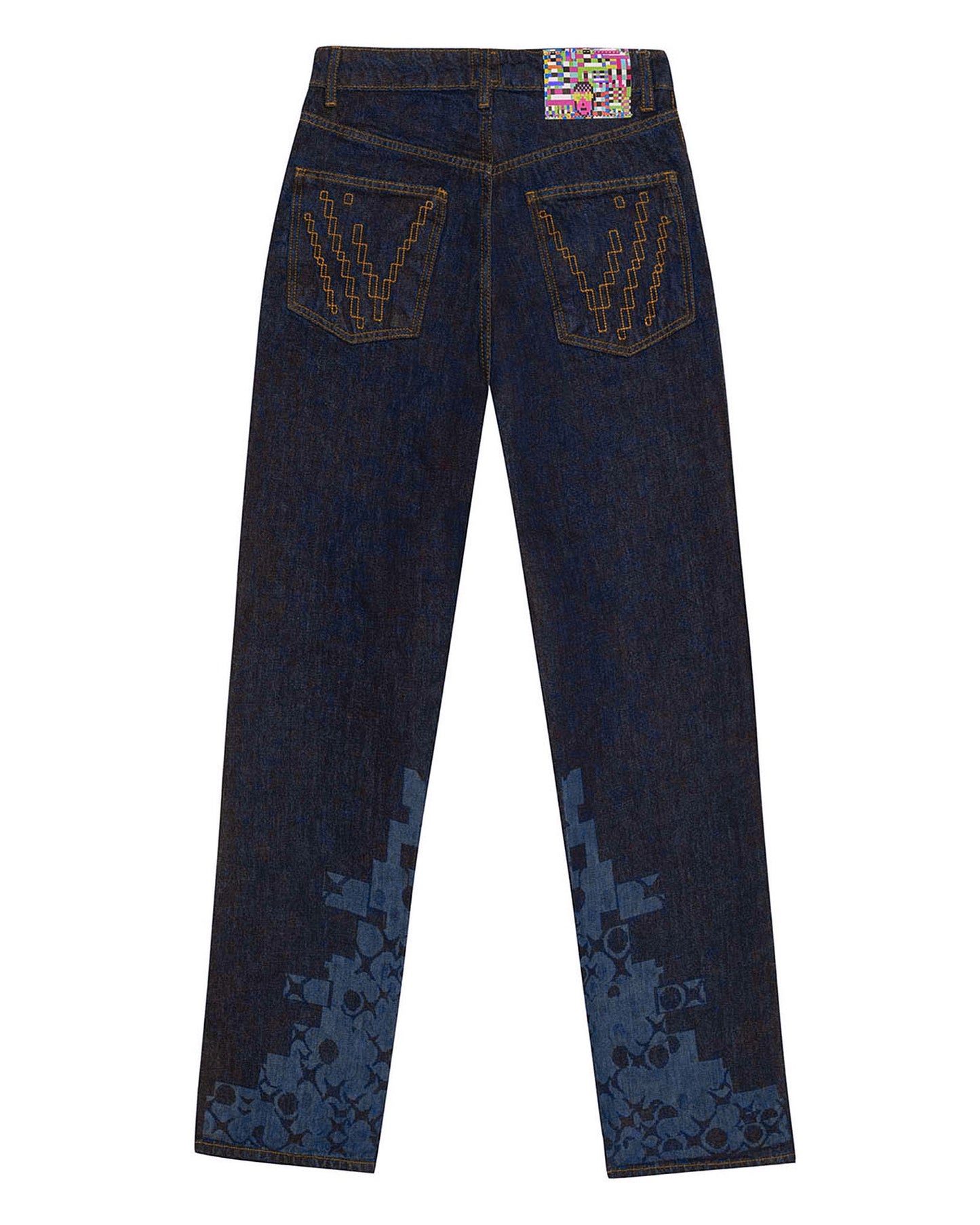 Flat lay back view of the GLIX "Cumulus" feminine fit jeans in dark wash denim, featuring tonal blue pixelated graphics on the lower legs, orange "V" stitch embroidery on the pockets, and a colorful digital glitch waist patch.