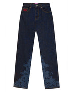 Front flat lay view of the GLIX "Cumulus" feminine fit jeans in dark wash denim, featuring tonal blue pixelated graphics on the lower legs and a red embroidered logo on the coin pocket.