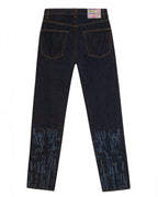Flat lay back view of the GLIX "The Maze" masculine fit jeans, showcasing the colorful pixelated waist patch, black "V" embroidery on the pockets, and tonal blue maze graphics on the lower legs.