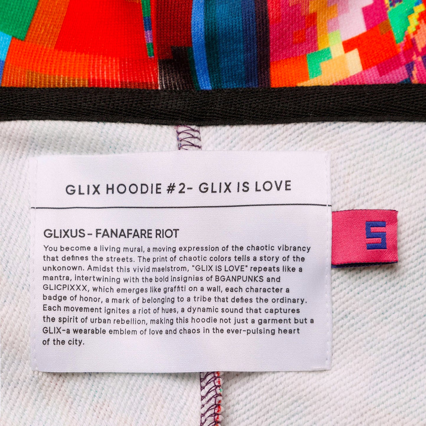 Colorful hoodie with a label detailing 'GLIX HOODIE #2 - GLIX IS LOVE' and brand information.