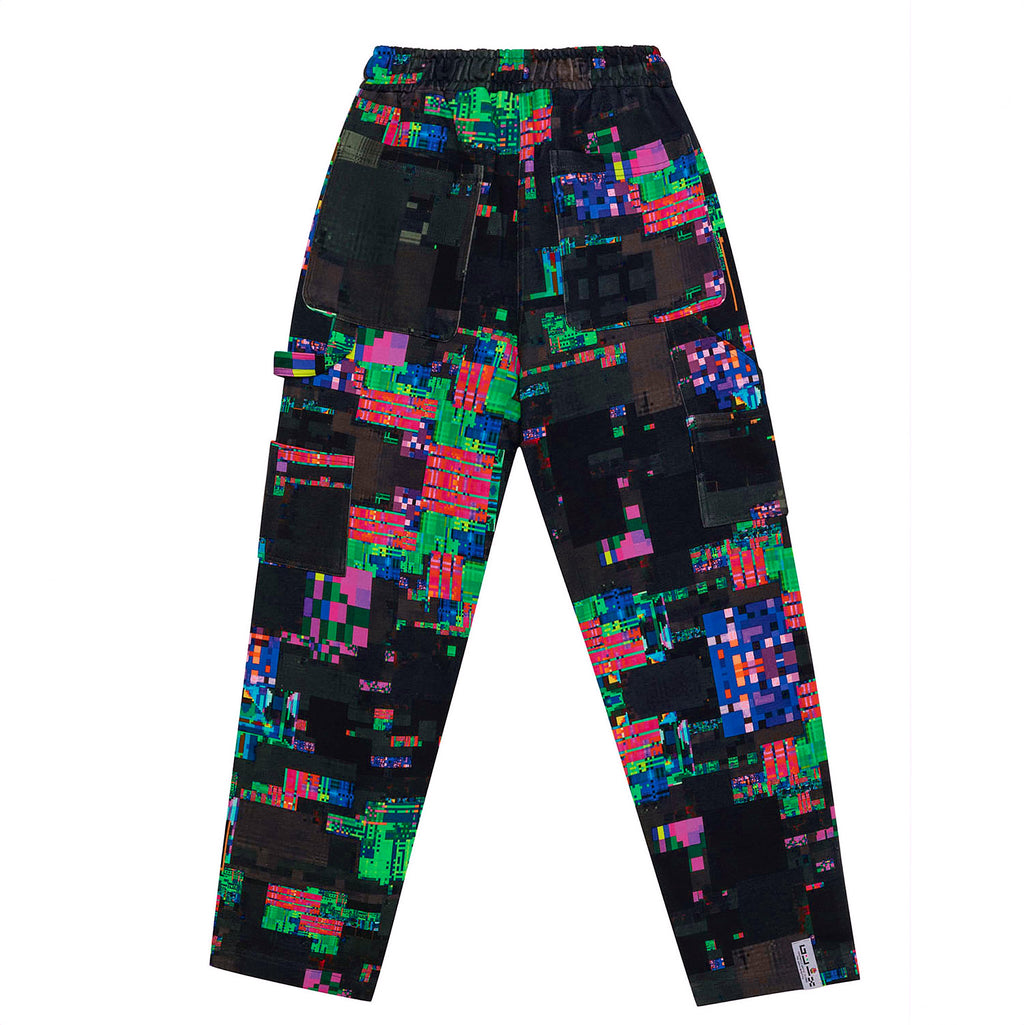 Flat lay back view of the GLIX "Screen Error" oversized sweatpants, featuring a dark, glitch-inspired all-over print with vibrant neon green, pink, and blue pixelated patterns and functional utility pockets.