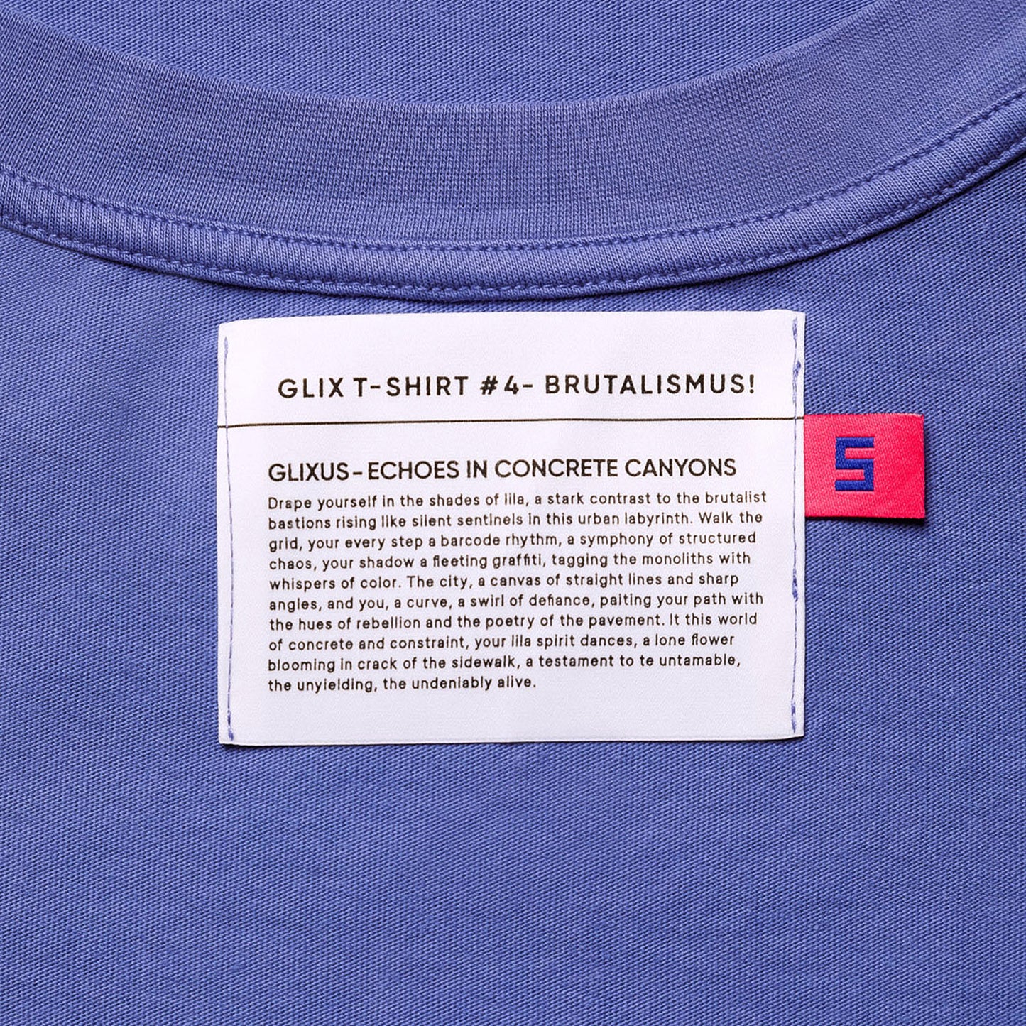 Close-up of the interior neck label for GLIX T-SHIRT #4 - BRUTALISMUS!, featuring the "GLIXUS - ECHOES IN CONCRETE CANYONS" brand manifesto.