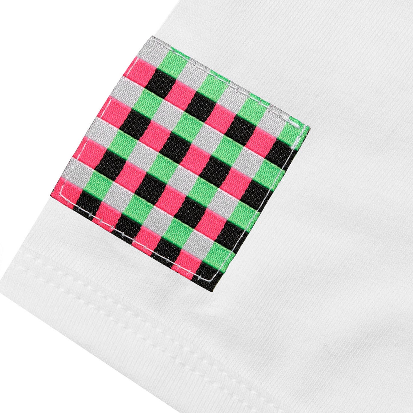 Close-up of the red embroidered GLIX block logo on the sleeve of a white crop top baby tee.