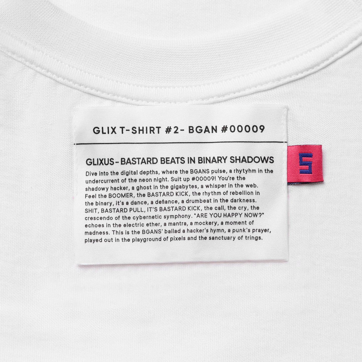 Interior neck label of a GLIX white crop top baby tee showing the product name BGAN #00009 and brand story text.